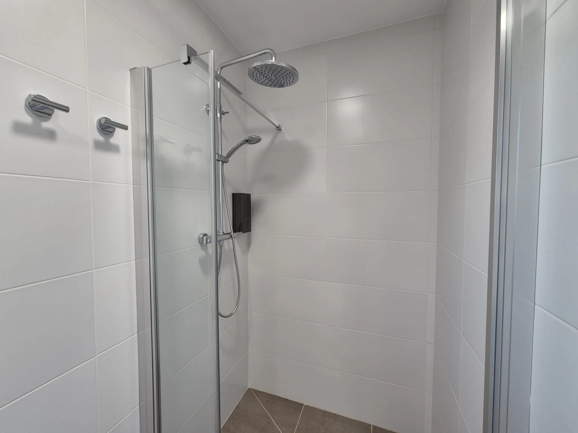 Private bathroom shower at Pensión Agro da Porta