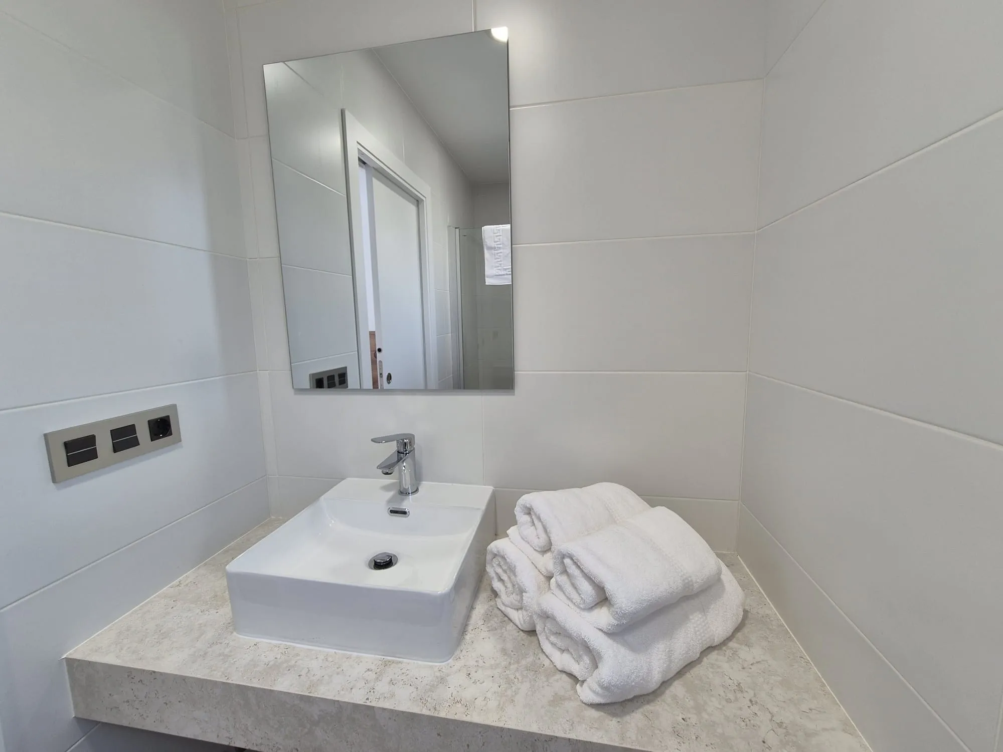 Bathroom sink area at Pensión Agro da Porta
